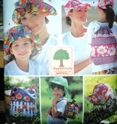 7539 Simplicity MS KIDS FLOPPY/PEAK HATS, BACK PACK BAGS PATTERN 21-23''